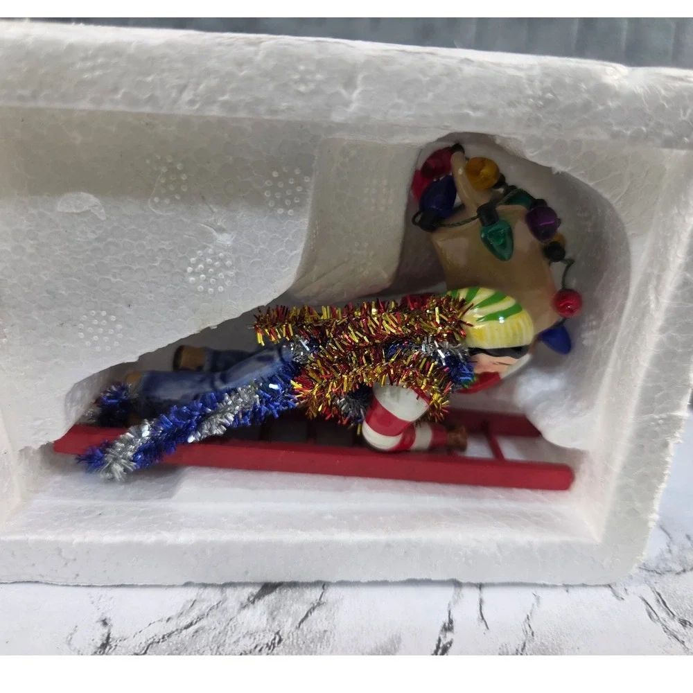 Department 56 Snow Village Christmas Trimming Man on Ladder 56.55110 Figurine